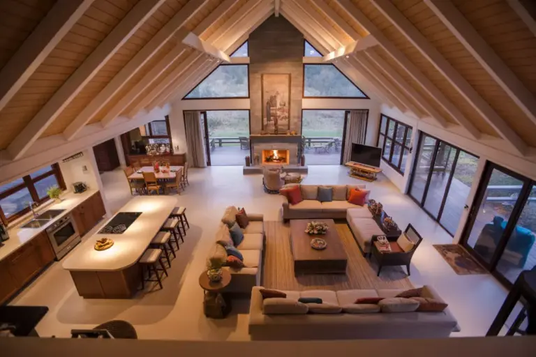 Open Plan Resort Cabin Great Room With Kitchen Island Vaulted Ceiling And Conversation Area