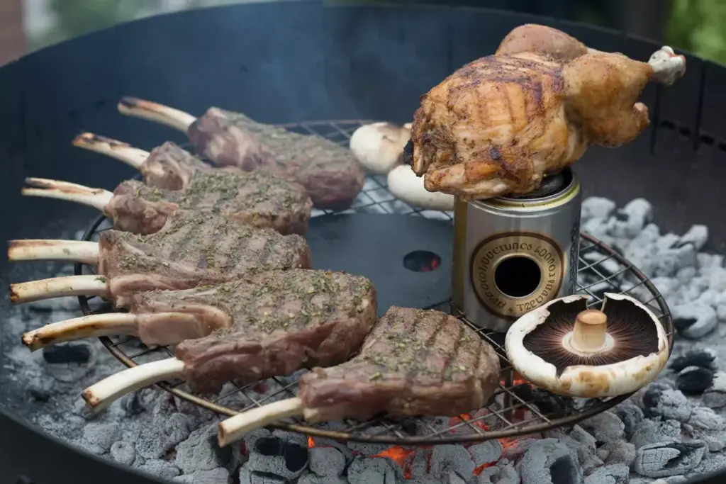 3 Herb Crusted Lamb Chops And Beer Can Chicken Grilling Over Hot Coals