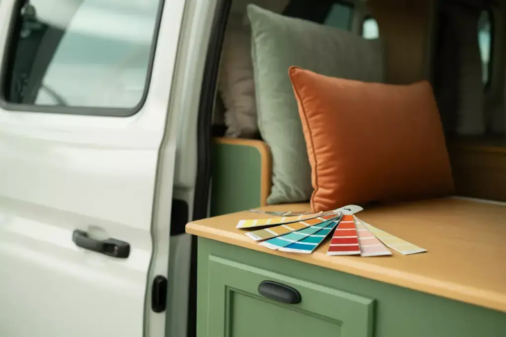 Close Up Of Camper Van Interior Demonstrating A Cohesive Color Palette With Swatches