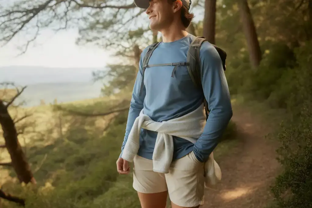 Casual Trail Explorer In Cotton Shirt And Fleece On Forested Path