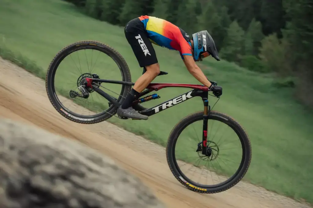 Trek Top Fuel XC Race Bike Accelerating Through Smooth Singletrack In Racing Position