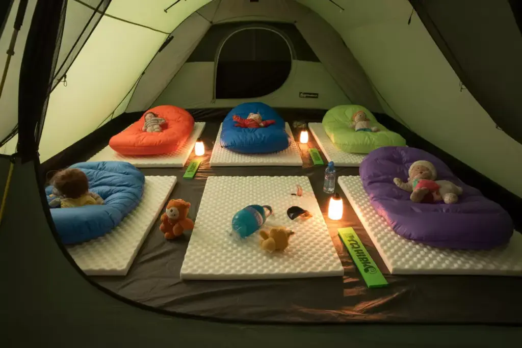 Tent Sleeping Area With Foam Boards Under Sleeping Bags For Comfort