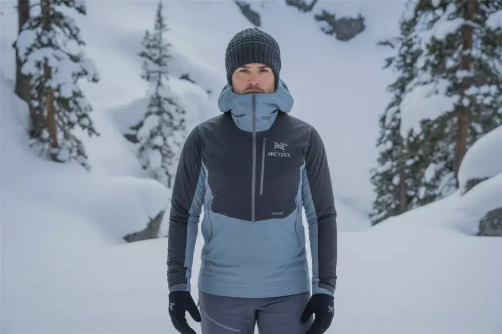 The Arc Teryx Grotto Toque Winter Outfit In A Snowy Mountain Setting