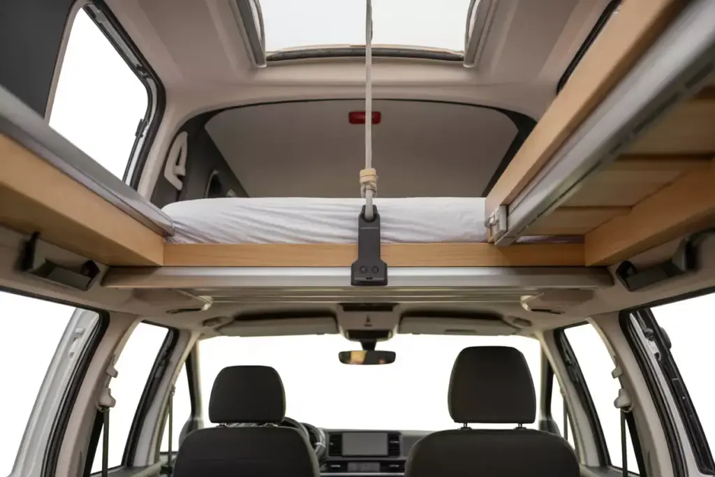 Ceiling Mounted Bed Platform Raised In High Roof Minivan For Floor Space