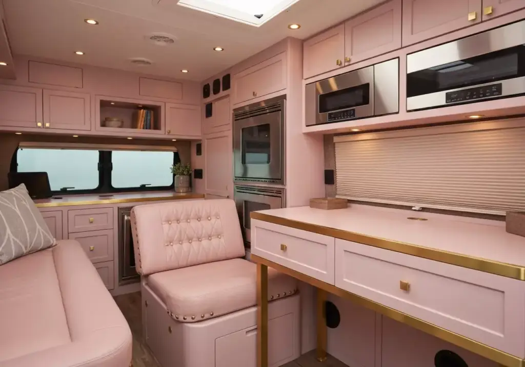A Contemporary Van Interior With Blush Pink Leather Brass Details And Integrated Technology