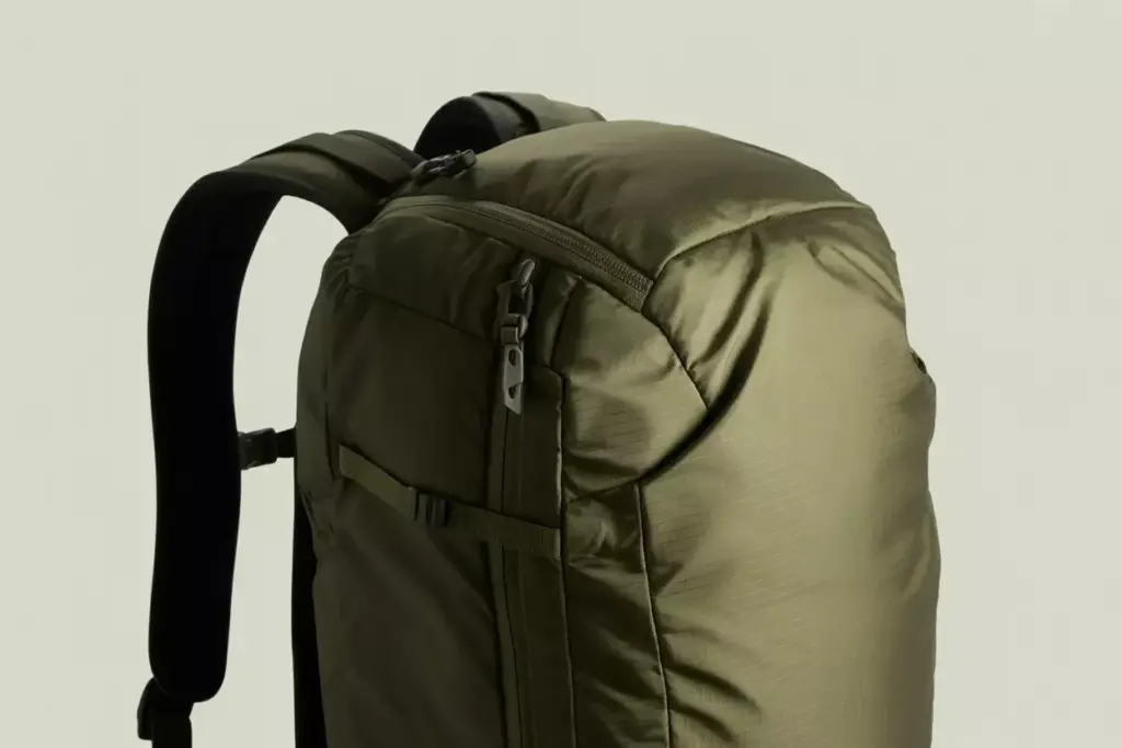 Premium Minimalist Backpack In Muted Earth Tones With Clean Lines And Modular Attachments