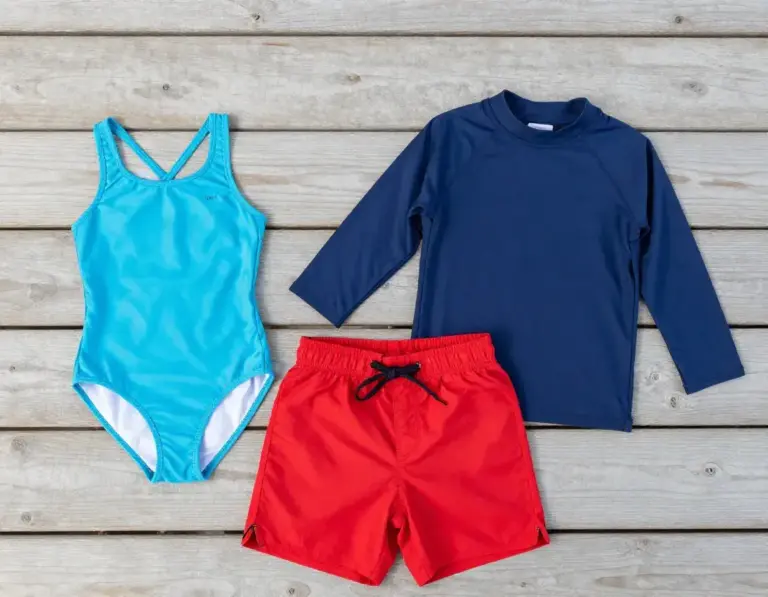 Featured Two Swimsuits And A Rash Guard For Daily Camp Water Activities